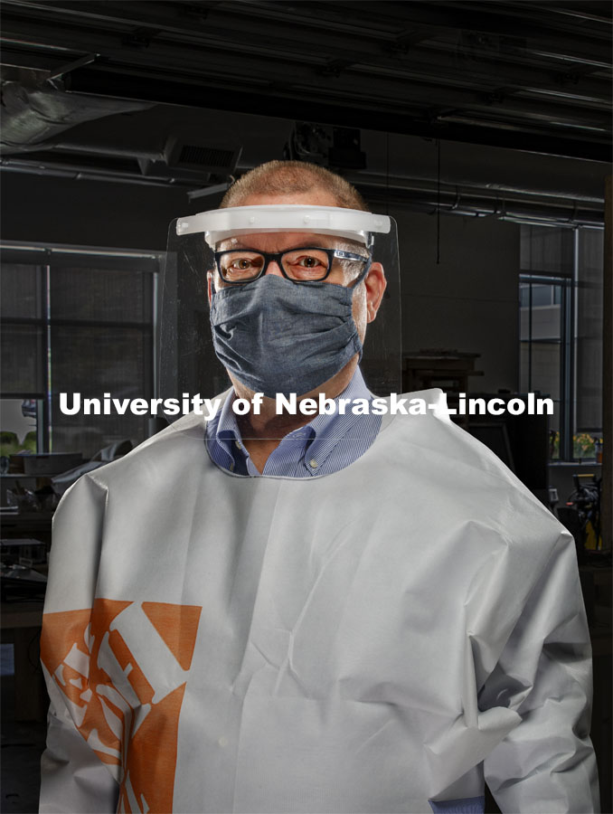 Bob Wilhelm, Vice Chancellor Research and Economic Development is wearing face shield and gown made at UNL. August 19, 2020. Photo by Craig Chandler / University Communication.
