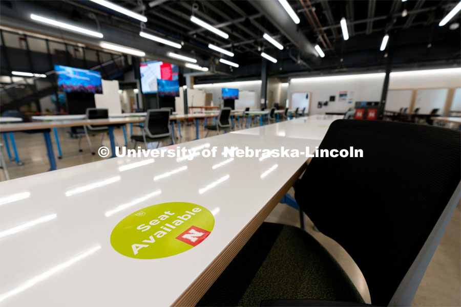 A table with a “seat available” sticker is photographed inside the Johnny Carson Center for Emerging Media Arts during the first day of in-person instruction at the University of Nebraska-Lincoln on Monday, August 24, 2020. Photo by Jordan Opp for University Communication.
