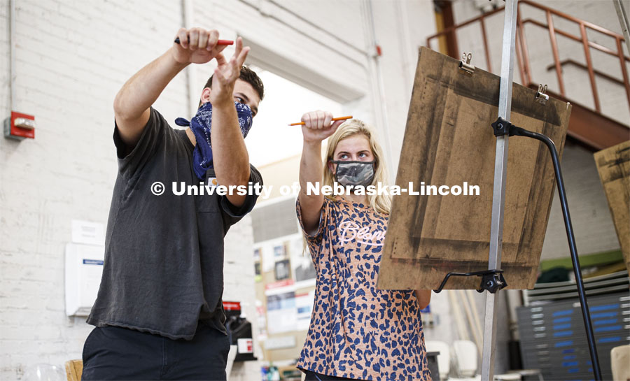Camryn Burkhalter, a sophomore from Omaha, gets instruction of measuring for perspective from instructor Chance Allen. First day for in-person learning for the fall semester. August 24, 2020. Photo by Craig Chandler / University Communication.