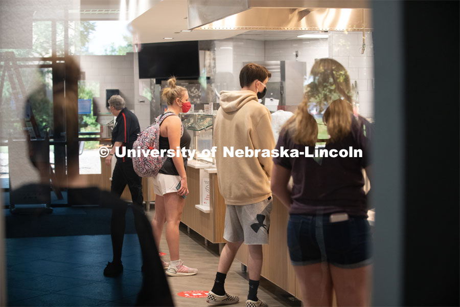 Students wait for their meals in the newly renovated Dinning Center in the East Campus Union. First day for in-person learning for the fall semester. August 24, 2020. Photo by Gregory Nathan / University Communication.