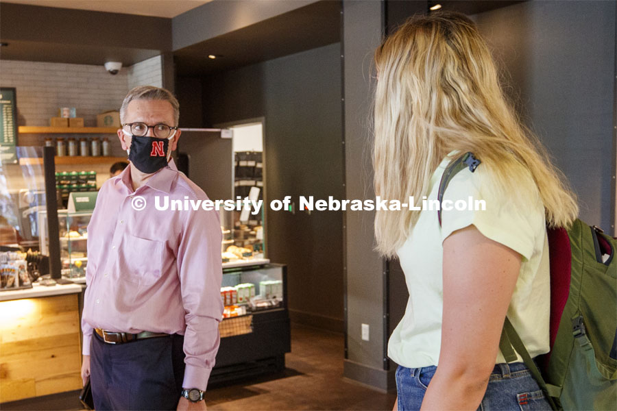 Chancellor Ronnie Green talks with Lauren Dunn, a junior from Omaha, as he waits for his coffee at the Nebraska Union Starbucks. First day for in-person learning for the fall semester.  August 24, 2020. Photo by Craig Chandler / University Communication.