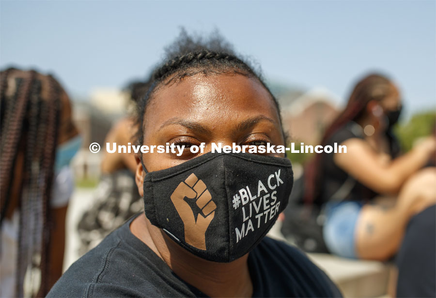 Dominique Liu-Sang wears a Black Lives Matter mask at the sit-in sponsored by the Black Student Union to draw attention to the shooting of Jacob Blake in Kenosha, WI. August 25, 2020. Photo by Craig Chandler / University Communication.