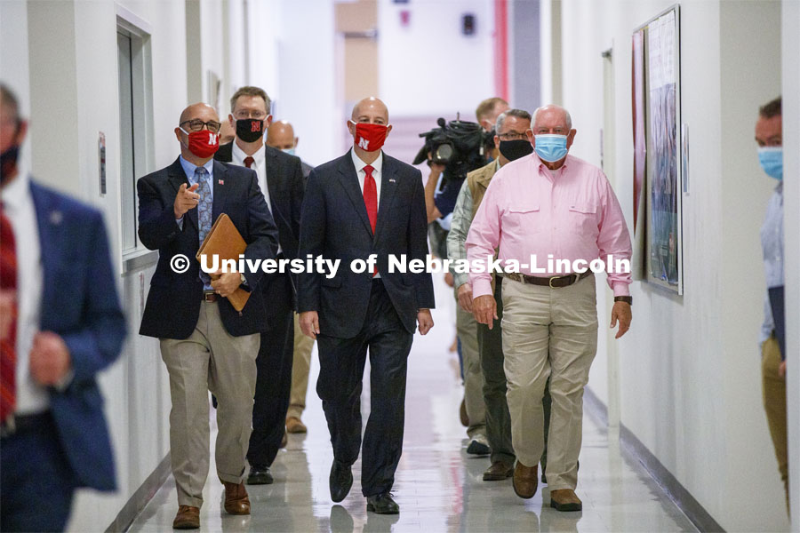 UNL Harlan Vice Chancellor for IANR and NU Vice President Mike Boehm, left, Governor Pete Rickets and United States Secretary of Agriculture Sonny Perdue walk through the hallway of the Food Innovation Center on Nebraska Innovation Campus. September 4, 2020. Photo by Craig Chandler / University Communication.