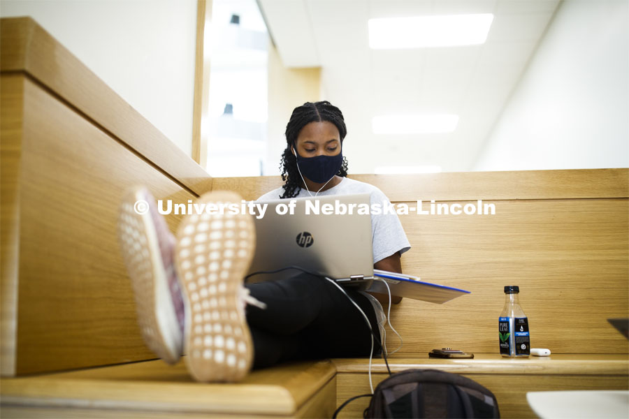 Kyra Baptiste studies in the foyer of the College of Business. September 14, 2020. Photo by Craig Chandler / University Communication.