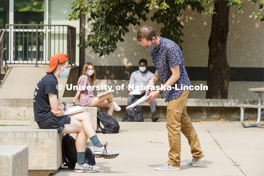 Ben Evjen, Assistant Professor of Practice, works with Preston Parry during his Design 2 class outside the Woods Art Building. September 16, 2020. Photo by Craig Chandler / University Communication.