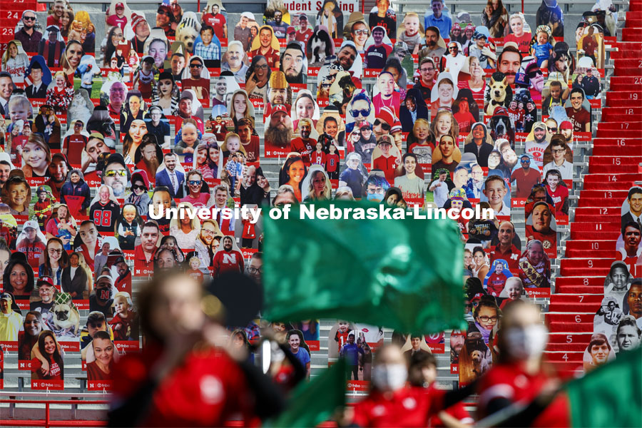 Cardboard cutouts of fans fill the stands in Memorial Stadium. Cornhusker Marching Band, Cheer Squad and Homecoming Royalty met in the empty Memorial Stadium to record performances that will air during Husker football games on the Big 10 Network during the upcoming season. October 18, 2020. Photo by Craig Chandler / University Communication.