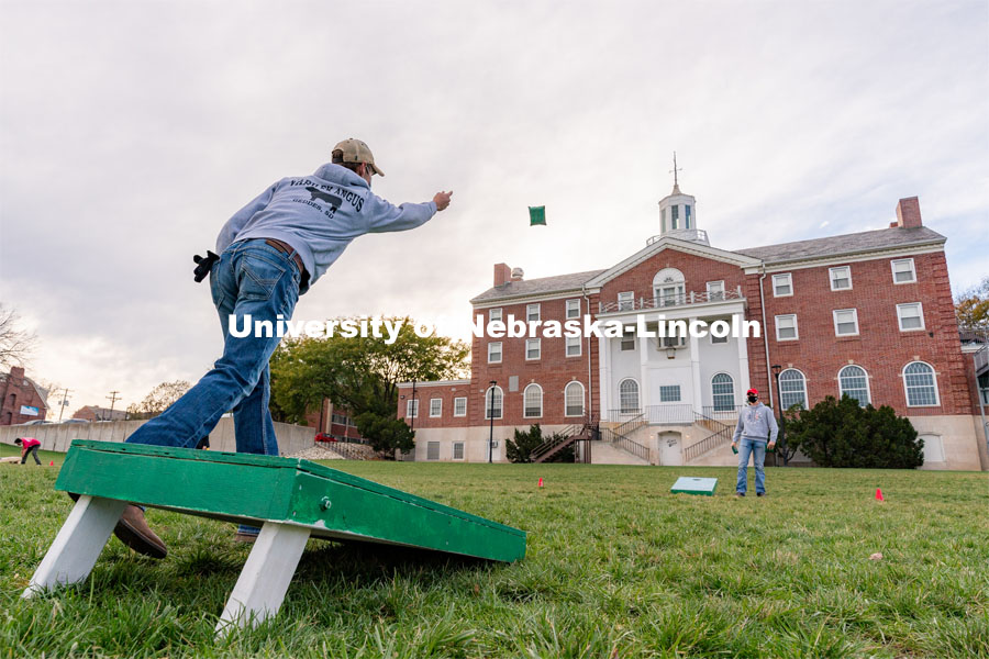 Students toss beanbags during the ASUN Cornhole Competition at the Cather-Pound Greenspace on Wednesday, Oct. 28, 2020, in Lincoln, Nebraska. Photo by Jordan Opp for University Communication.