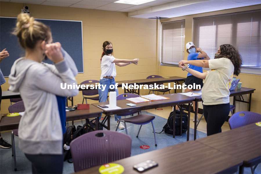 Students in Barbara Terwilliger’s Health and Wellness in the Elementary Classroom course do “energizers” demonstrations. Energizers in the classroom help young students learn while moving around. November 4, 2020. Photo by Craig Chandler / University Communication.