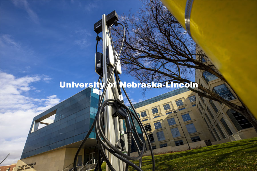 There are four new charging stations on the UNL campuses awaits electric vehicles in front of Howard Hawks Hall. The stations are capable of charging Teslas, along with other popular brands of electric vehicles. November 12, 2020.  Photo by Craig Chandler / University Communication.