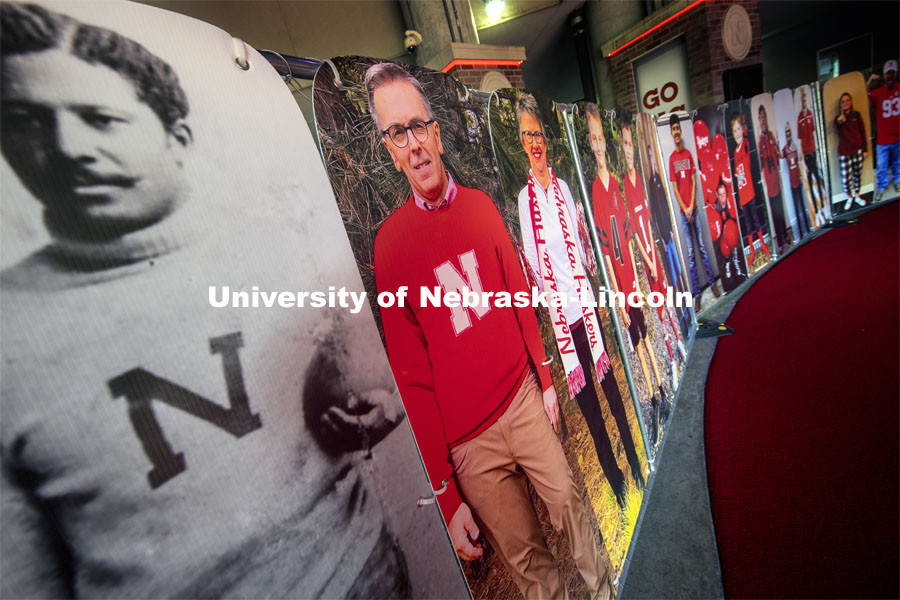 Chancellor Ronnie Green is in great company in the tunnel walk with George Flippin (left) and Ronnie’s wife, Jane, are among the nearly 180 full-sized fan cutouts that line the Tunnel Walk carpet in North Stadium. Flippin was the first Black University of Nebraska football player (1891-1894). More than 6,000 corrugated plastic cutouts fill the lower level of east stadium, the tunnel walk, and part of north stadium to remind the Huskers who has the Greatest Fans in College Football. November 12, 2020. Photo by Craig Chandler / University Communication.