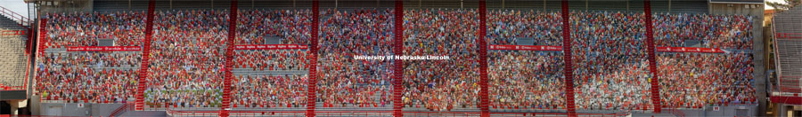 This composite image shows the more than 6,000 corrugated plastic cutout of Husker fans that fill the lower level of East Stadium. The composite removes the 3 middle sections of East Stadium bleachers that are empty and await family and friends who can attend the game. November 12, 2020. Photo by Craig Chandler / University Communication.