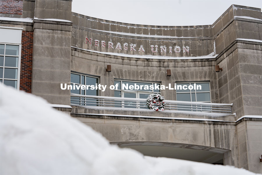 The Nebraska Union is ready for christmas with it's wreath and bricks covered in snow. Snow on UNL City Campus. December 12, 2020. Photo by Jordan Opp for University Communication.