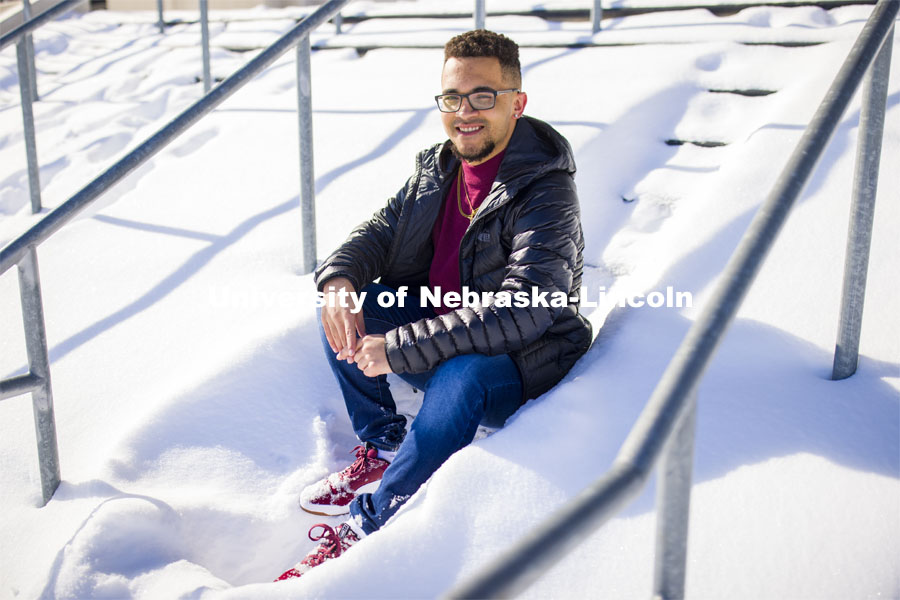 Drake Keeler is a journalism major who is leading the Daily Nebraskan's Black Lives Matter project and telling more Black stories on campus. He hopes to continue that work in his future career. Drake is a junior in journalism, specializes in sports writing. He is posing in front of Memorial Stadium in the snow. Photo for a Black History Month feature. January 27, 2021. Photo by Craig Chandler / University Communication.