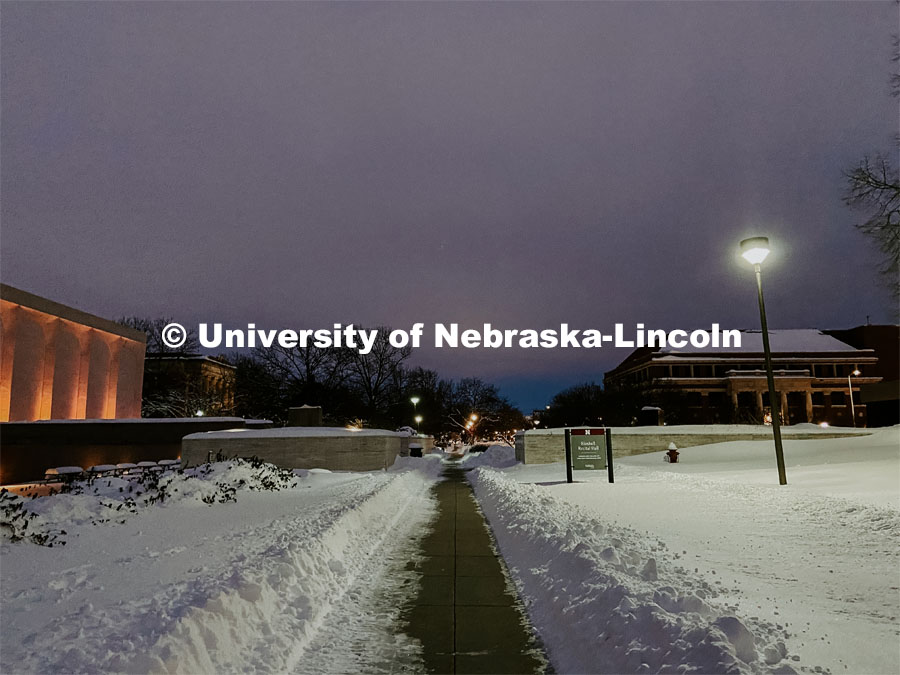 After a record-setting snowfall, the paths are cleared for the student's first day back. Snow in January on City Campus. January 27, 2021. Photo by Katie Black / University Communication.