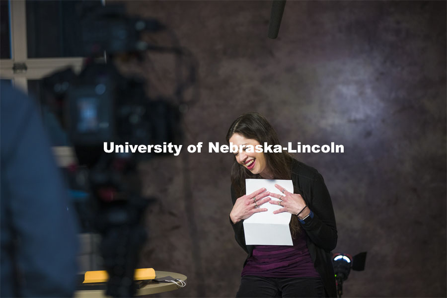 Karen Wills, University Program Council Nebraska Program Coordinator, reacts while reading a letter from one of her students. March 1, 2021. Photo by Craig Chandler / University Communication.