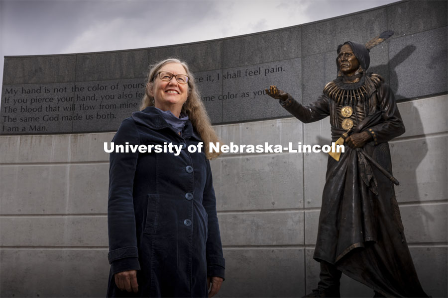 Margaret Jacobs, Chancellor's Professor of History; Director, Center for Great Plains Studies, with the statue of Chief Standing Bear. University of Nebraska-Lincoln. March 12, 2021. Photo by Craig Chandler / University Communication.