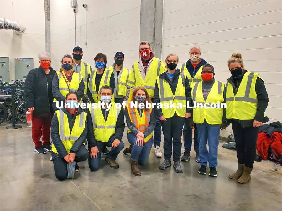 The first group of more than 150 UNL faculty, student and staff members volunteering at the COVID vaccine clinic at Pinnacle Bank Arena this week. April 7, 2021. Photo by Jesse Brophy / University Communication.