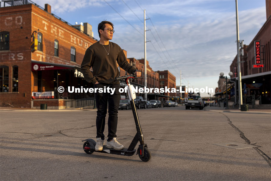 Koo Sheng Jit, a junior in management, poses in the Haymarket for an ASEM recruitment story. April 14, 2021. Photo by Craig Chandler / University Communication.