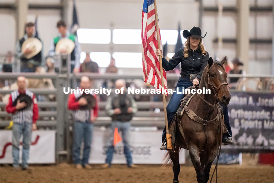 Cowboys lower their hats as the Star-Spangled Banner is performed before the Nebraska Cornhusker College Rodeo at the Lancaster Event Center. April 24, 2021. Photo by Jordan Opp for University Communications.
