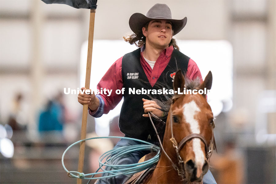 A member of the University of Nebraska rodeo team takes a lap around the track before the Nebraska Cornhusker College Rodeo at the Lancaster Event Center. April 24, 2021. Photo by Jordan Opp for University Communications.