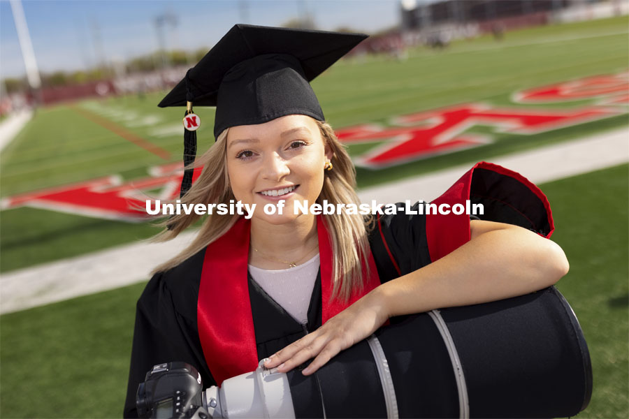 Maddie Washburn, senior in the College of Journalism and Mass Communications, spent her college career photographing for Husker Athletics and has also photographed the Super Bowl and the NFL Draft. April 26, 2021. Photo by Craig Chandler / University Communication.  