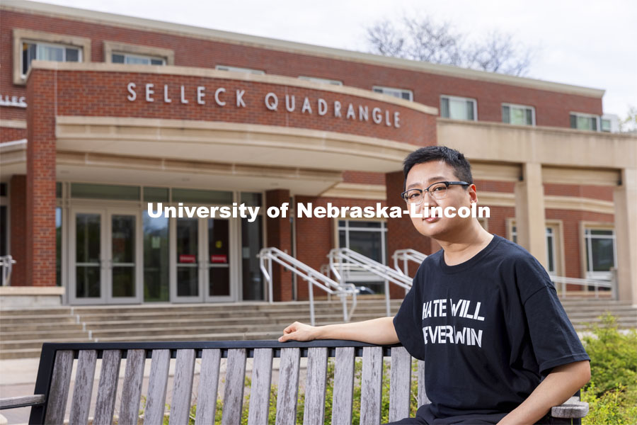 Tamayo Zhou for Husker Dialogues. Zhou poses in front of the Selleck Quadrangle. April 27, 2021. Photo by Craig Chandler / University Communication.