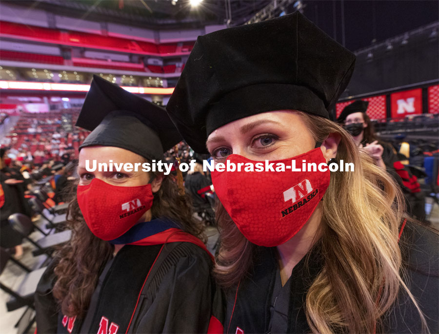 Katie Reutzel, a doctoral student in human sciences made matching masks for herself and Professor heather Rasmussen. Graduate Commencement at Pinnacle Bank Arena. May 7, 2021. Photo by Craig Chandler / University Communication.  