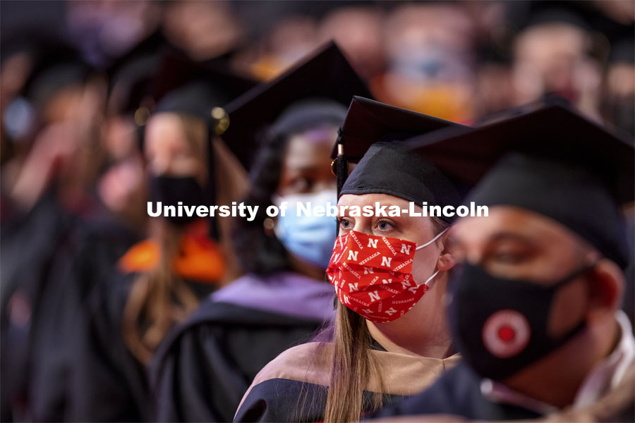 Margaret Puncekar wore a Nebraska mask for the ceremony. Graduate Commencement at Pinnacle Bank Arena. May 7, 2021. Photo by Craig Chandler / University Communication.