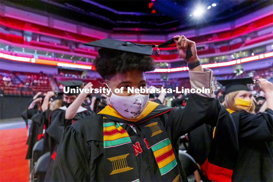 Kristina Bayton moves her tassel to the left at the completion of the ceremony. Graduate Commencement at Pinnacle Bank Arena. May 7, 2021. Photo by Craig Chandler / University Communication.
