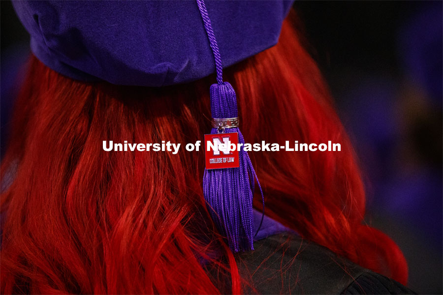 The College of Law tassel hangs off Elizabeth Weidner’s tam. College of Law Graduation at Pinnacle Bank Arena. May 7, 2021. Photo by Craig Chandler / University Communication.