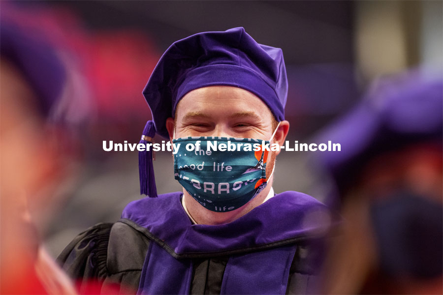 Jackson Powell sports a mask that says, the good life, on a great day. College of Law Graduation at Pinnacle Bank Arena. May 7, 2021. Photo by Craig Chandler / University Communication.