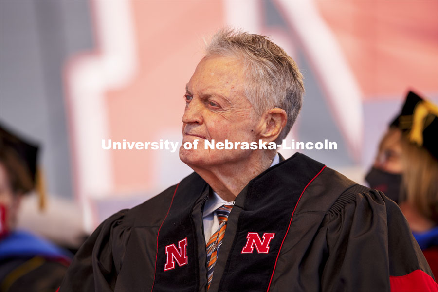 Former Husker Head Coach Tom Osborne watches an introductory video on the big screen.  Osborne delivered the commencement address “Begin with The End in Mind”. UNL Commencement in Memorial Stadium. May 8, 2021. Photo by Craig Chandler / University Communication.