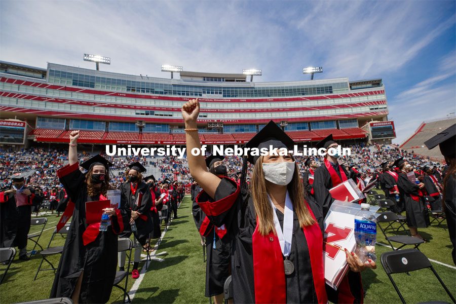 Destiney Chitrodom celebrates after turning her tassel at the end of the commencement. UNL Commencement in Memorial Stadium. May 8, 2021. Photo by Craig Chandler / University Communication.