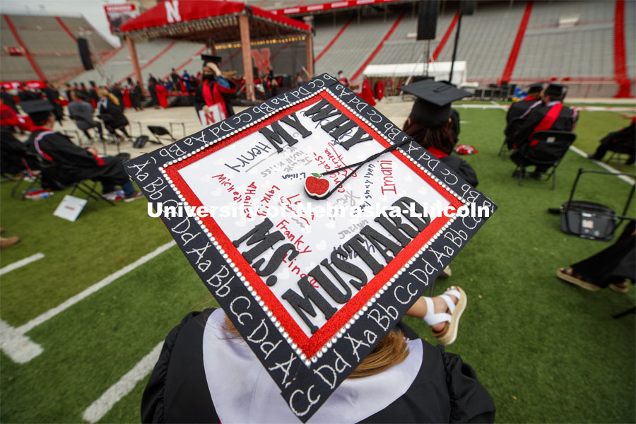 Alexa Mustard’s mortar board is signed by her students in the classroom where she did her student teaching. The university conferred a record 3,594 degrees during the May commencement ceremonies. UNL Commencement in Memorial Stadium. May 8, 2021. Photo by Craig Chandler / University Communication.