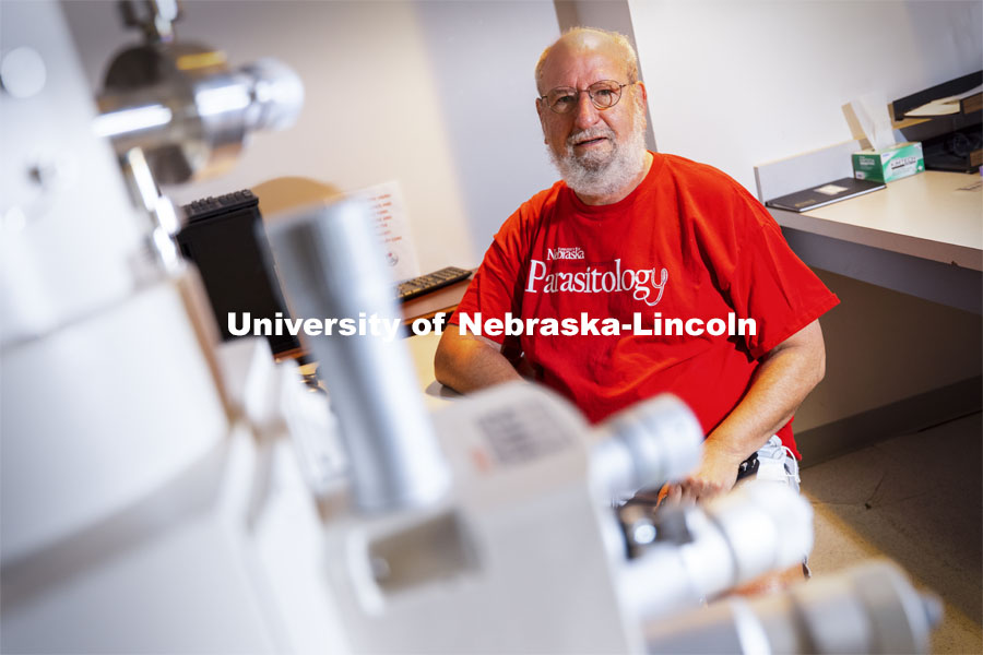 Nebraska's Karl Reinhard in his lab on East Campus. By analyzing the fossilized gut contents of a U.S. Marine killed in the Korean War, Reinhard and his colleagues have determined what the Marine ate to survive in the 12 days following a siege of the Chosin Reservoir by 120,000 Chinese troops. The analysis indicated that the Marine subsisted on so-called famine foods — eating mostly stems, roots and leaves from flowering plants. The case study helps illustrate the dire realities of trying to consume adequate nutrition after being separated from supply lines by overbearing enemy forces. May 12, 2021. Photo by Craig Chandler / University Communication.