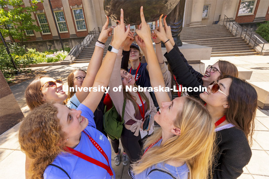 A group of students touch Archie’s foot for good luck as each group made photos for social media. New Student Enrollment began this week and will continue through July 9. June 2, 2021. Photo by Craig Chandler / University Communication.