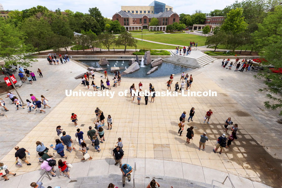 Parents and incoming students break into groups on the Nebraska Union Plaza as the afternoon session of New Student Enrollment begins. June 24, 2021. Photo by Craig Chandler / University Communication.