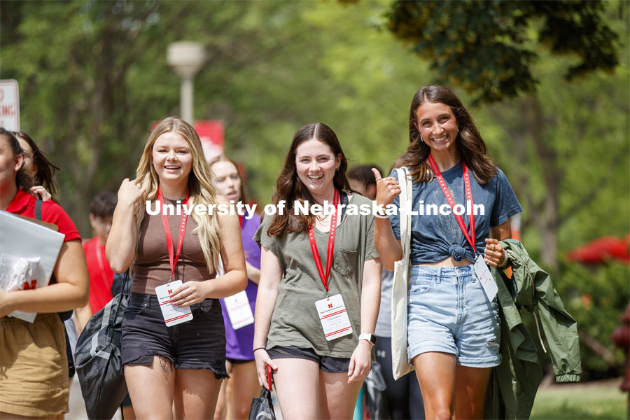 A group of young women walk together on their campus tour with New Student Enrollment. June 24, 2021. Photo by Craig Chandler / University Communication.