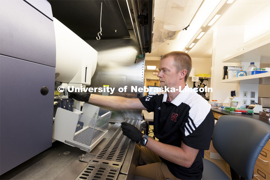 Flow Cytometry Service Center Manager, Dirk Anderson works with samples in a flow Cytometry sorter in the Morrison Center for Virology. Nebraska Center for Biotechnology. June 25, 2021. Photo by Craig Chandler / University Communication.