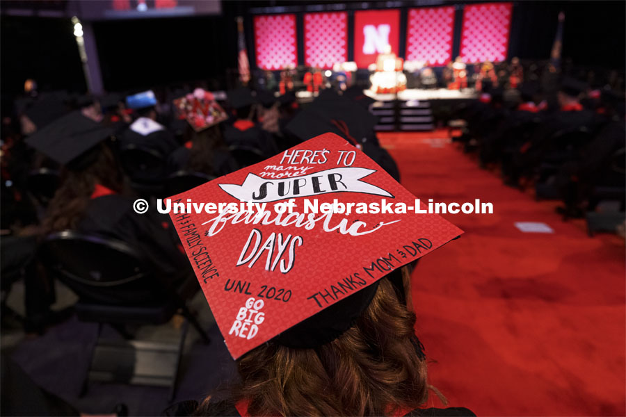 Grace Billig decorated her mortar board to reflect the day. Undergraduate Commencement at Pinnacle Bank Arena. August 14, 2021. Photo by Craig Chandler / University Communication.