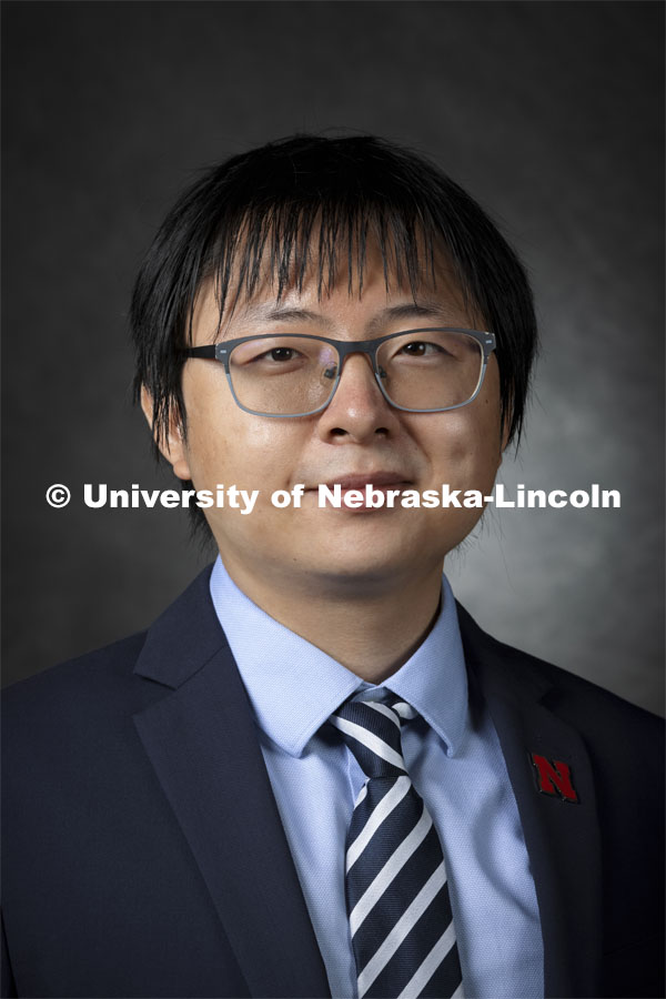 Studio portrait of Yifan Gong, Assistant Professor, Economics. 2021 New Faculty Orientation. August 18, 2021. Photo by Craig Chandler / University Communication.