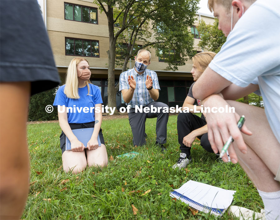 Joe Dauer, associate professor in the School of Natural Resources, describes populations of plants outside Hardin Hall. First day of classes for fall semester. August 23, 2021. Photo by Craig Chandler / University Communication.