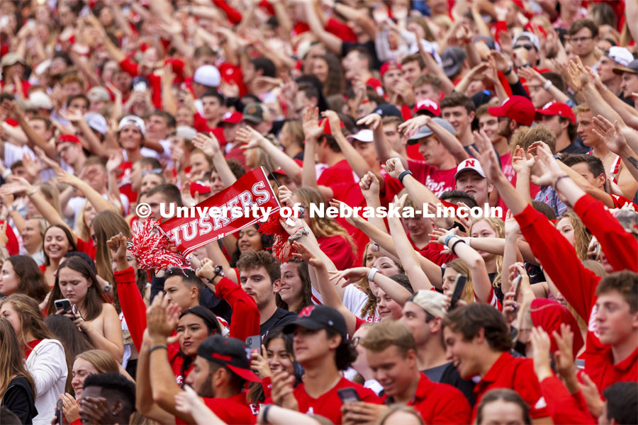 The student section hold up a Husker sign as they cheer on the team. Nebraska vs. Fordham University football game. September 4, 2021. Photo by Craig Chandler / University Communication.
