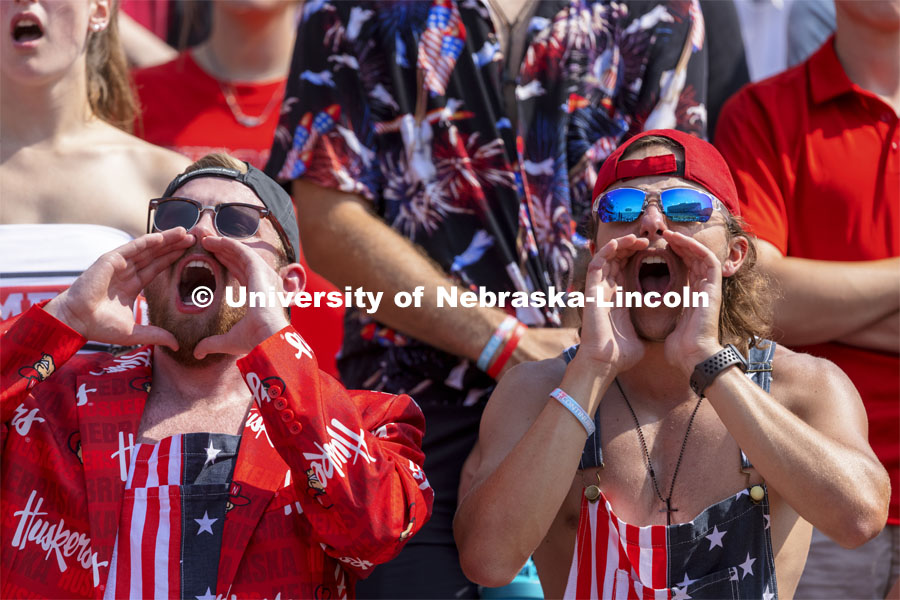 Fans cheer at the Nebraska vs. Buffalo University game on the 20th anniversary of 9/11. Photo by Craig Chandler / University Communication.