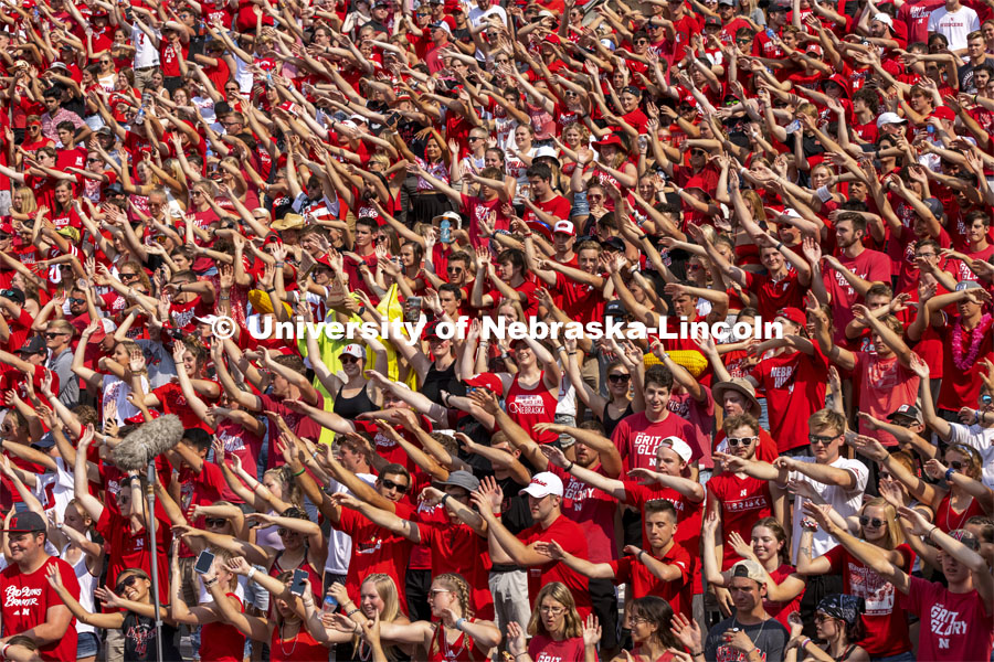 Fans cheer the first Husker touchdown Saturday. Nebraska vs. Buffalo University game on the 20th anniversary of 9/11. Photo by Craig Chandler / University Communication.