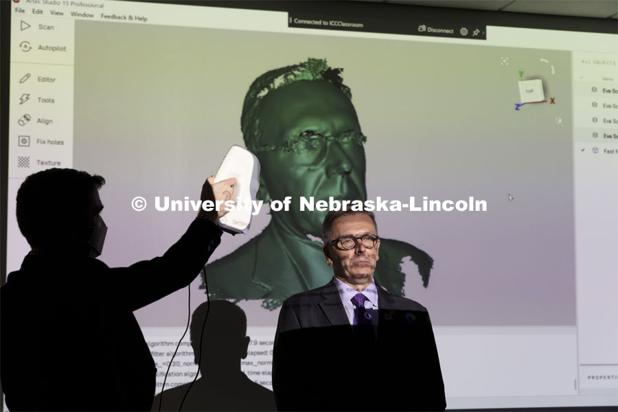 Chancellor Ronnie Green sits for a demonstration of the 3D Scanner. Nebraska Innovation Studio grand re-opening open house. September 16, 2021. Photo by Craig Chandler / University Communication.