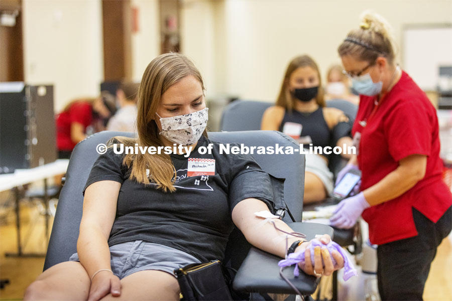 Michaela Aulner, a nursing student, from Omaha, donates Tuesday. Homecoming week blood drive in Nebraska Union. September 28, 2021. Photo by Craig Chandler / University Communication.