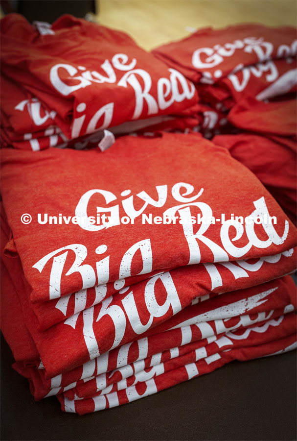 A stack of t-shirts await blood donars. Homecoming week blood drive in Nebraska Union. September 28, 2021. Photo by Craig Chandler / University Communication.