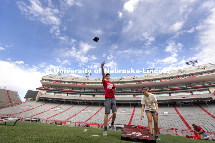 Homecoming Cornhole Tournament. Teams of two square off against each other in the classic lawn game of cornhole in Memorial Stadium. September 29, 2021. Photo by Craig Chandler / University Communication.