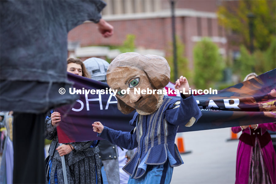 William Shakespeare gets his groove on as the Nebraska Repertory Theatre members walked the parade to advertise their haunted house. Homecoming Parade and Cornstalk Festival. October 1, 2021. Photo by Craig Chandler / University Communication.